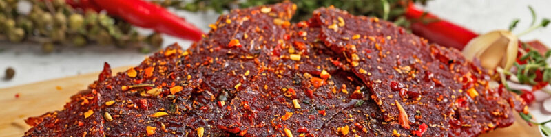 Sliced peppered beef jerky, the product that goes inside custom jerky pouches